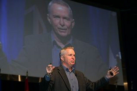 John Speaking at one of his popular seminars